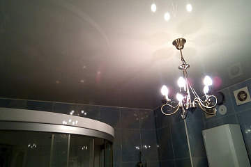 Слив воды с натяжных потолков